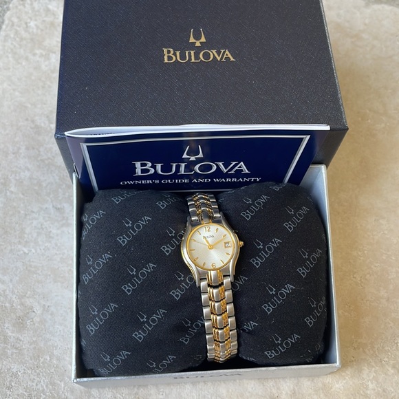 COPY - Bulova lady battery water resistant 30m silver and gold w/date main image 4